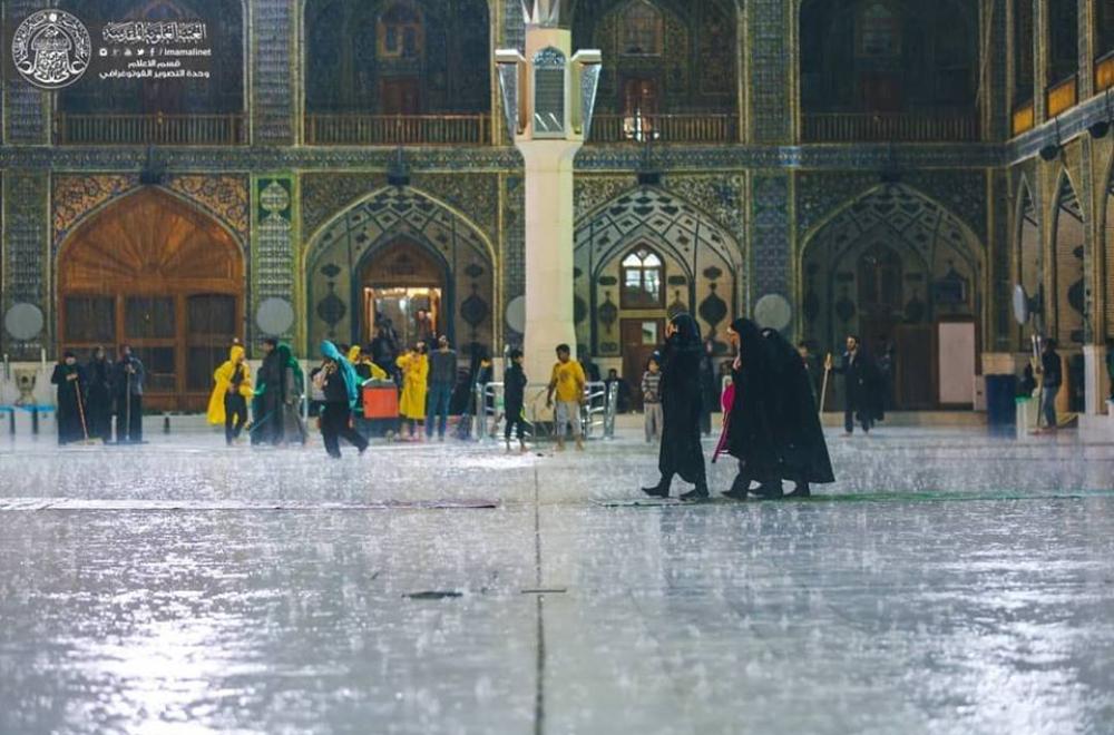 بالصور .. أمطار الخير والبركة في رحاب مرقد أمير المؤمنين (عليه السلام)