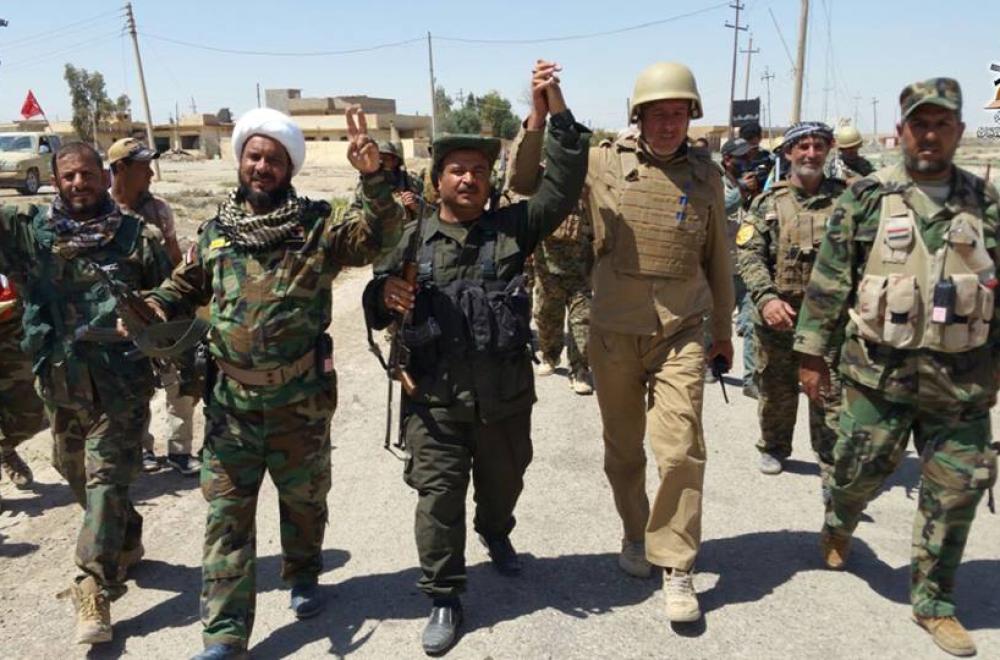 مبلغو لجنة إرشاد العتبة العلوية يوزعون الدعم اللوجستي على قوات الحشد جنوب الموصل ويشاركون في تحرير مدينة الحضر من دنس “داعش”