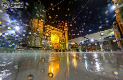 بالصور .. أمطار الخير والبركة في رحاب مرقد أمير المؤمنين (عليه السلام)