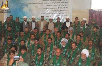 لجنة الارشاد والتعبئة التابعة للعتبة العلوية المقدسة تكرم موكب خدام الحسين (عليه السلام) من محافظة البصرة بوشاح أمير المؤمنين (صلوات الله وسلامه عليه)