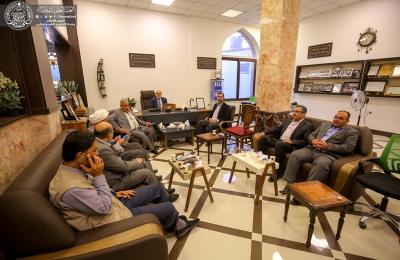 وفد من العتبة العلوية المقدسة يزور متحف النجف الأشرف التوثيقي