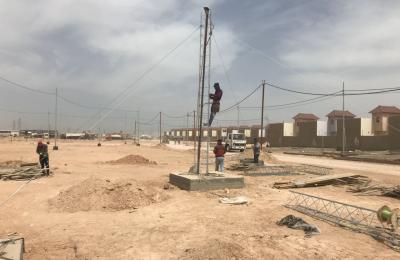 الكوادر الهندسية في قسم الإعلام بالعتبة العلوية المقدسة تنجز أعمال نصب برج خدمة الانترنت في مجمع قنبر السكني