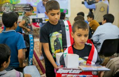 برنامج الزائر الصغير في العتبة العلوية المقدسة يُكَرِّم أبناء الشهيد الشيخ مشتاق الزيدي