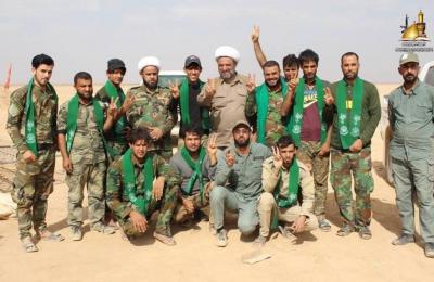 لجنة الإرشاد في العتبة العلوية تشارك الحشد الشعبي في قصف مواقع لداعش الإرهابي على الحدود العراقية السورية وينقلون توصيات ودعاء المرجعية لهم 