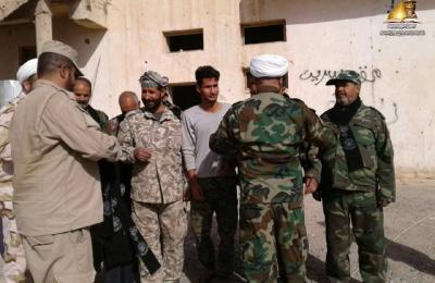 مبلغو العتبة العلوية يتفقدون أبطال الحشد المبارك في قاطع محافظة صلاح الدين ويقلدونهم وشاح امير المؤمنين(ع)