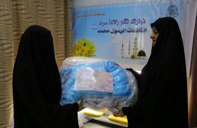 شعبة العلاقات النسوية توزع الهدايا على المواليد الجدد الذين تزامنت ولادتهم مع ولادة الرسول الأعظم (صلى الله عليه وآله)
