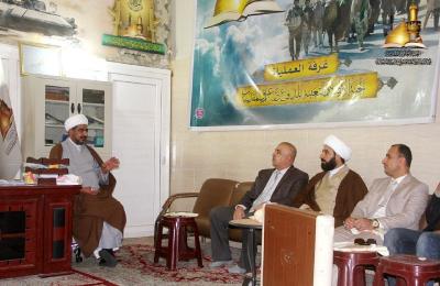 لجنة الإرشاد تُقلد عميد كلية العلوم وأساتذة الجامعة المستنصرية بوشاح أمير المؤمنين(عليه السلام) لمواصلتهم تقديم الدعم اللوجستي للمقاتلين