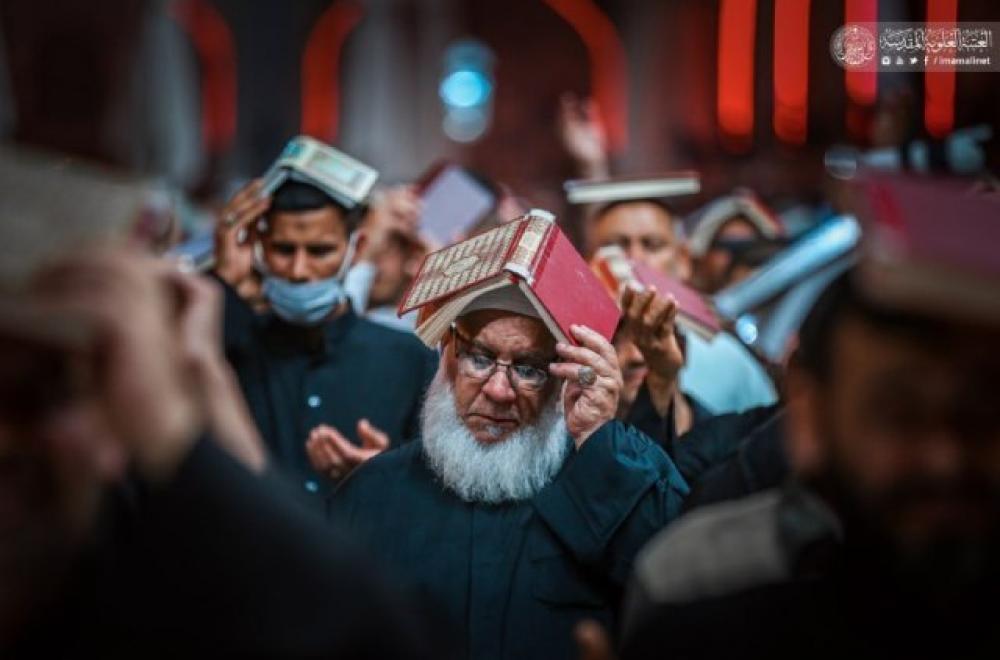 المؤمنون يؤدون مراسيم ليلة القدر الثانية ويقدمون العزاء باستشهاد أمير المؤمنين(عليه السلام)- صور- 