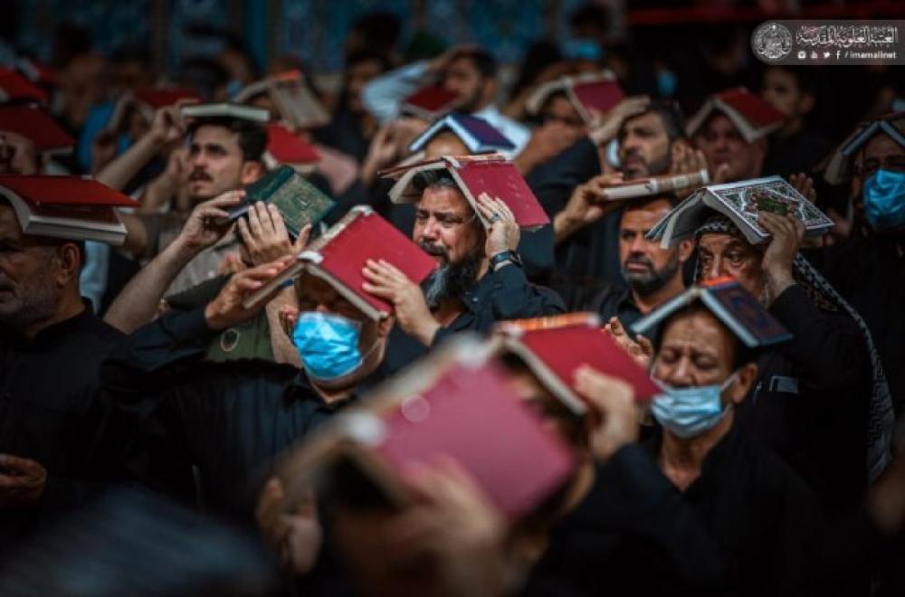 المؤمنون يؤدون مراسيم ليلة القدر الثانية ويقدمون العزاء باستشهاد أمير المؤمنين(عليه السلام)- صور- 