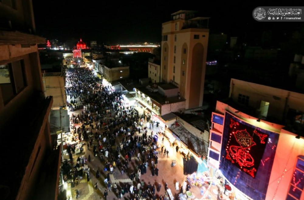 شاهد أجواء الزيارة وحركة المواكب من جوار مرقد أمير المؤمنين ع في ليلة القدر وحتى ساعات الصباح الأولى  