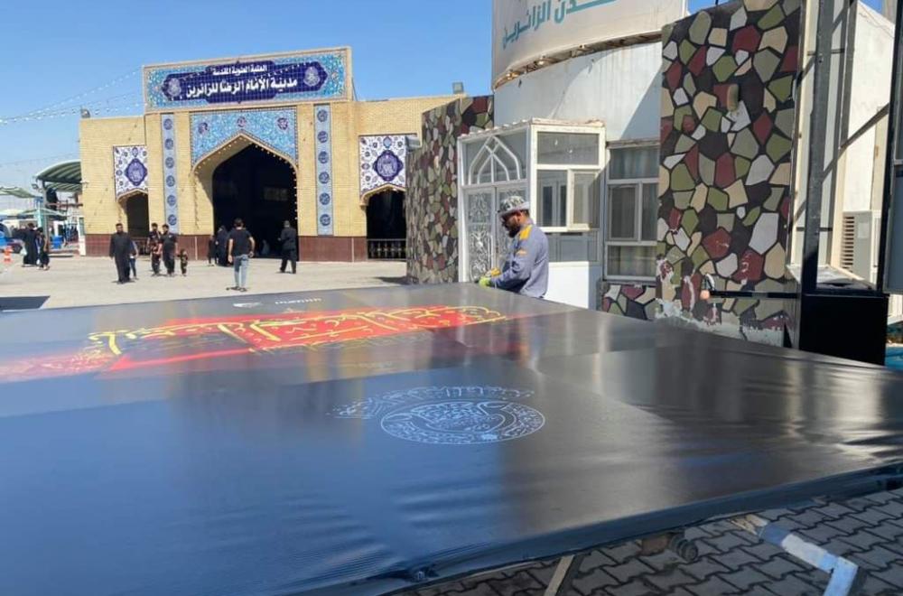  قسم الإعلام في العتبة العلوية ينشر آلاف قطع الدلالة  الخاصة بزيارة الأربعين