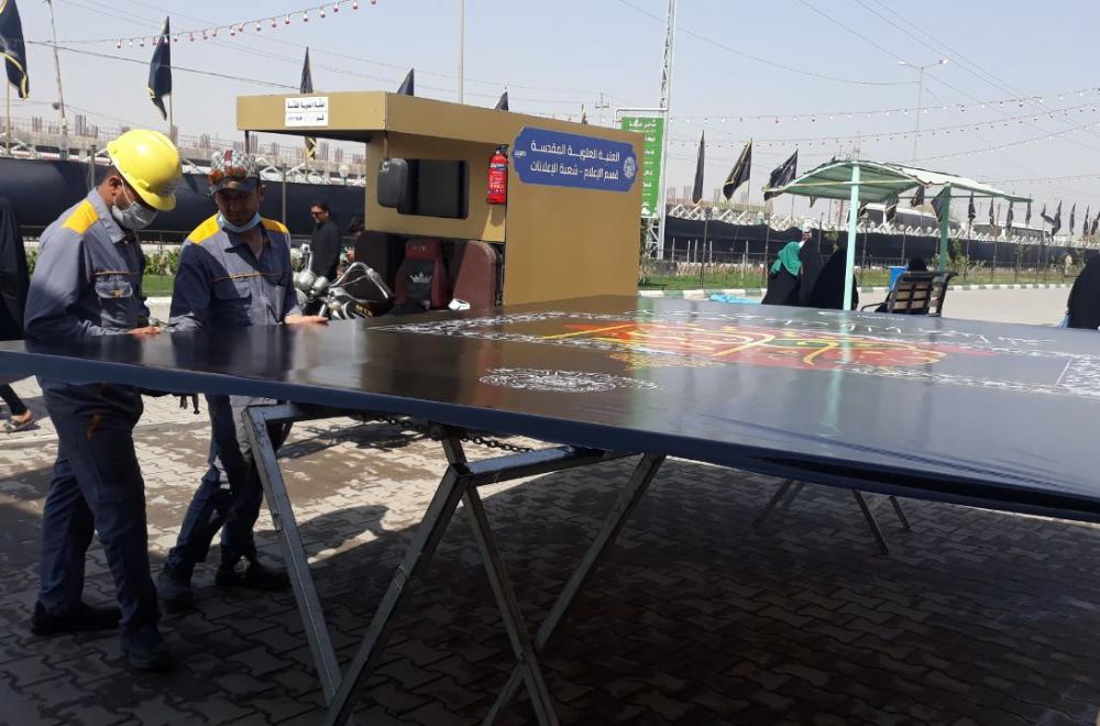  قسم الإعلام في العتبة العلوية ينشر آلاف قطع الدلالة  الخاصة بزيارة الأربعين