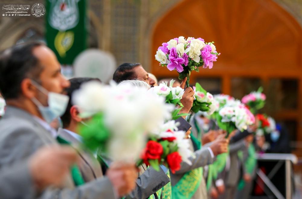 العتبة العلوية المقدسة تحتفي بمولد ريحانة رسول الله (ص) خلال الزيارة الصباحية بتوزيع الورود ونشر معالم الزينة