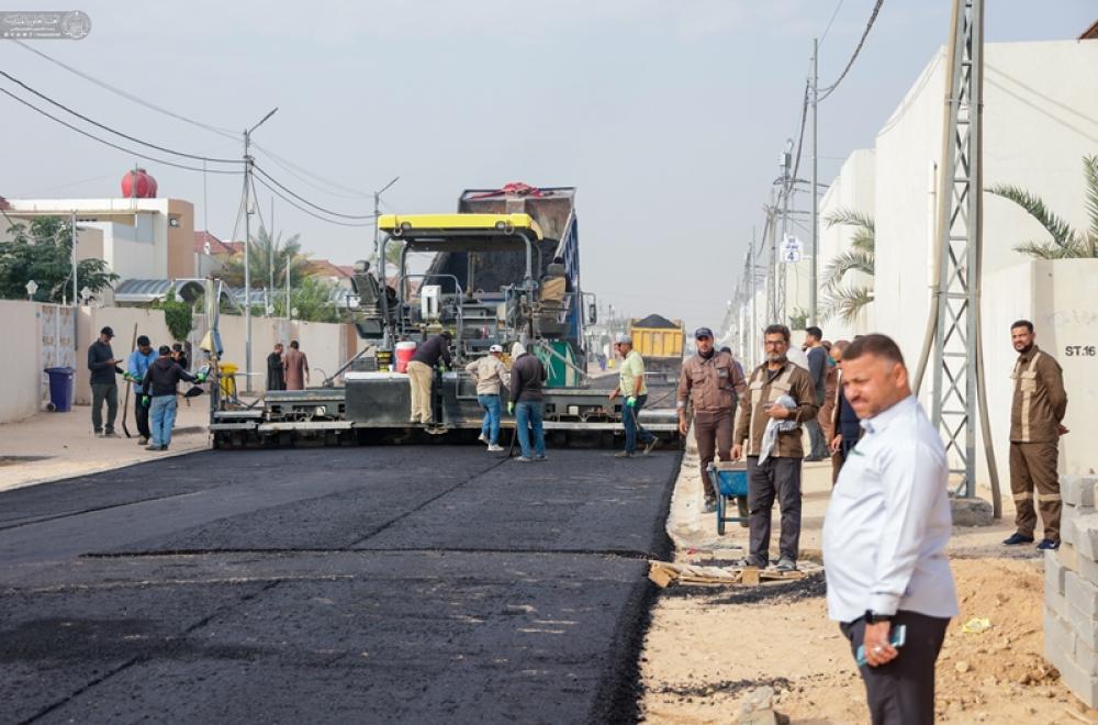 قسم الشؤون الهندسية يعبد شوارع مجمع قنبر السكني