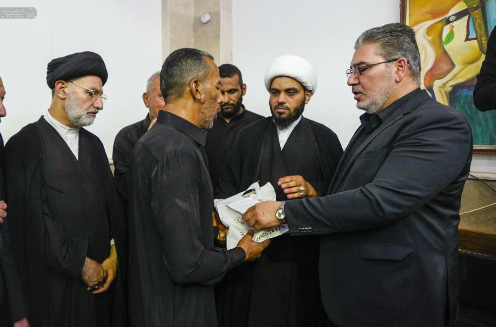 وفد العتبة العلوية المقدسة يحضر مجلس عزاء شهداء الخدمة الحسينية في الحيرة  