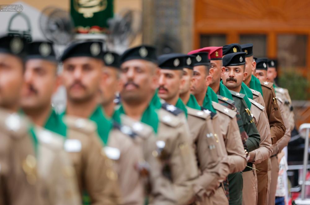 نخبة من ضباط كلية الشرطة يؤدون قسم الولاء في صحن أمير المؤمنين (عليه السلام) 
