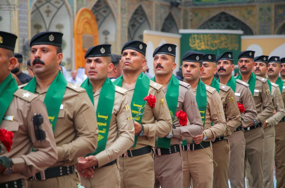 نخبة من ضباط كلية الشرطة يؤدون قسم الولاء في صحن أمير المؤمنين (عليه السلام) 